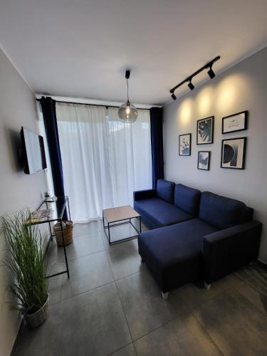 Z Widokiem Apartamenty - apartamenty z widokiem na góry i zewnętrzną baliąにあるシーティングエリア