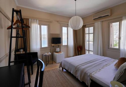 Postel nebo postele na pokoji v ubytování Kalkan Ayapa Hotel