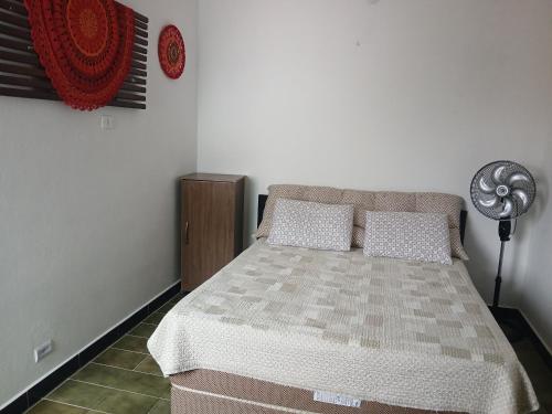 Postel nebo postele na pokoji v ubytování Casa da Paixão