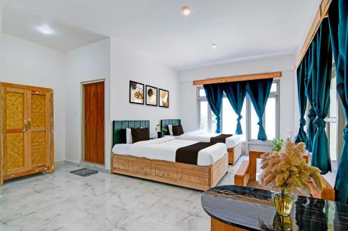 Cama o camas de una habitación en Collection O Pelling Kanchenjunga Mountain View