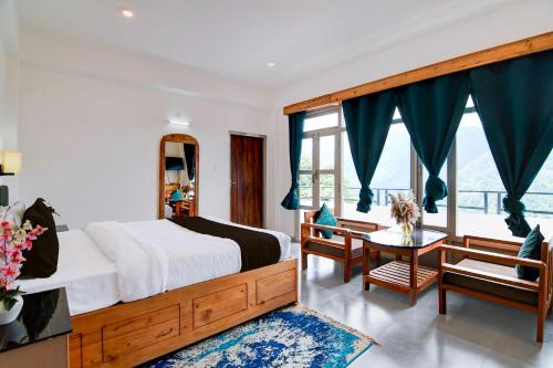 Cama o camas de una habitación en Collection O Pelling Kanchenjunga Mountain View
