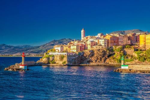 a city on the shore of a body of water at Casa Miot in Bastia