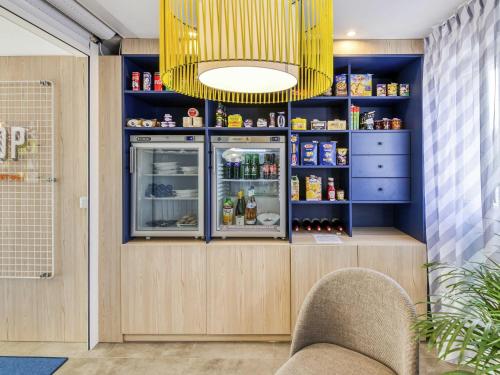 Η κουζίνα ή μικρή κουζίνα στο Aparthotel Adagio Access Saint Nazaire