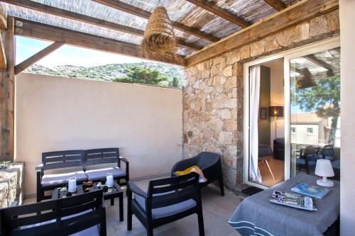 Posezení v ubytování Les Lauriers Roses