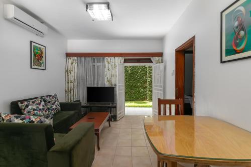 Posezení v ubytování Corinya Serviced Apartments