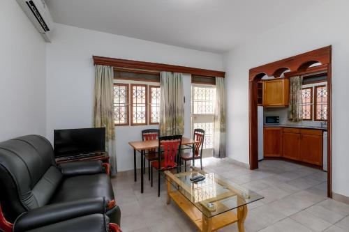 Kuchyň nebo kuchyňský kout v ubytování Corinya Serviced Apartments