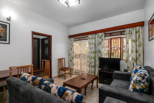Posezení v ubytování Corinya Serviced Apartments