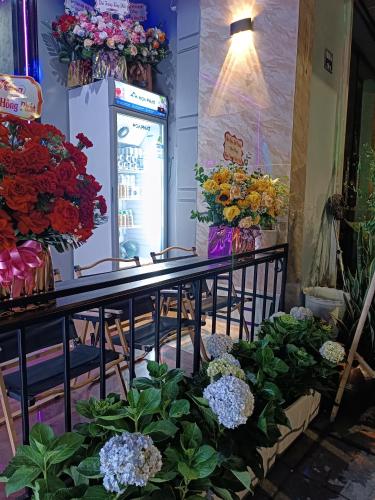 a bunch of flowers on display in a store at An Homestay - Bar & Motorbike Rental in Cao Bằng