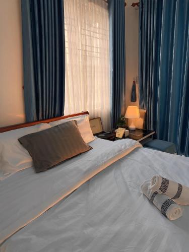 Postel nebo postele na pokoji v ubytování Mây Trắng Homestay