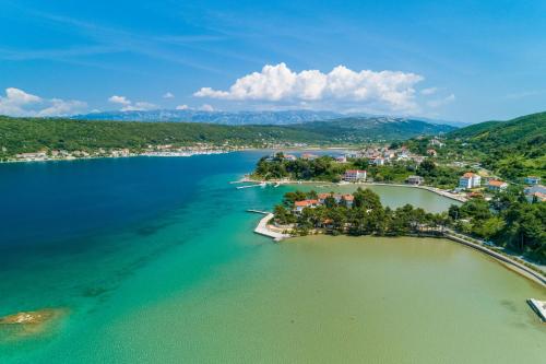 an aerial view of a small island in a body of water at Apartment Nedo in Supetarska Draga