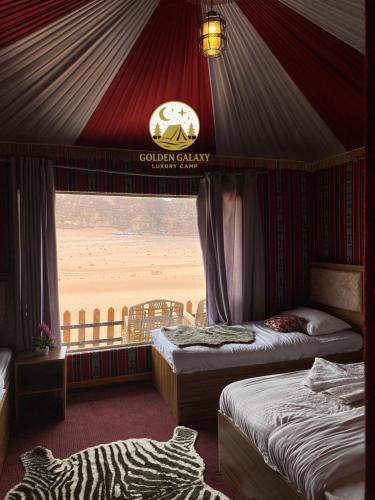 Ένα ή περισσότερα κρεβάτια σε δωμάτιο στο Golden Galaxy Luxury Camp