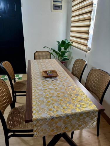 a table with a napkin on top of it at Elisa's 3BR Home with Pool in San Pablo