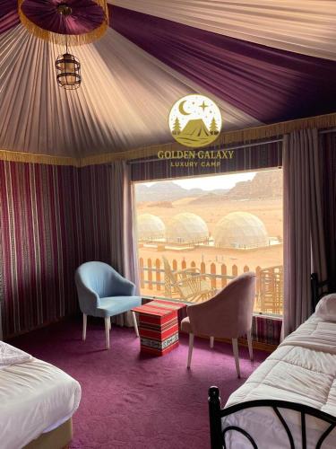 Ένα ή περισσότερα κρεβάτια σε δωμάτιο στο Golden Galaxy Luxury Camp