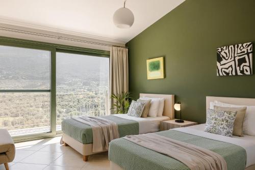Postel nebo postele na pokoji v ubytování Utopia Luxury Villa
