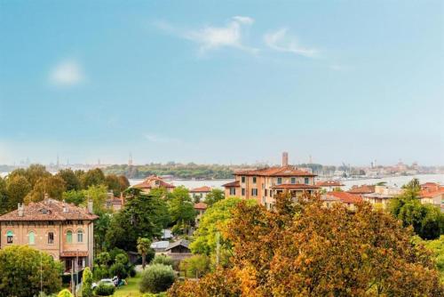 a view of a city with houses and trees at Hotel & Residence Venezia 2000 in Venice-Lido