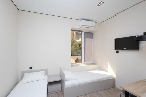 TV/trung tâm giải trí tại Grand Family Apartments