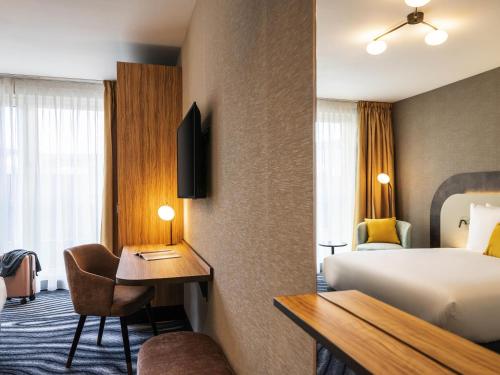 Un ou plusieurs lits dans un hébergement de l'établissement Mercure Amsterdam North Station