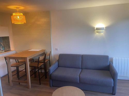 Χώρος καθιστικού στο Appartements rénovés vue golf