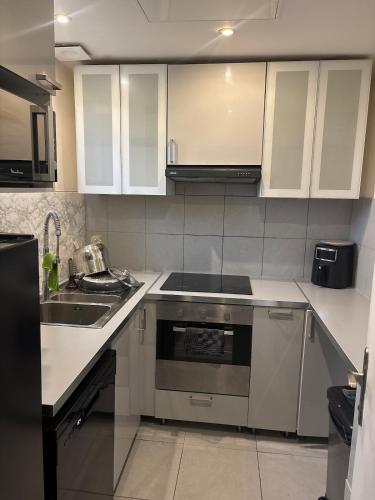 Dapur atau dapur kecil di Appartement Drancy proche RER
