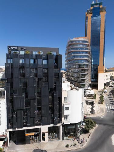 an aerial view of a building in a city at Onyx Hotel in St Julian's