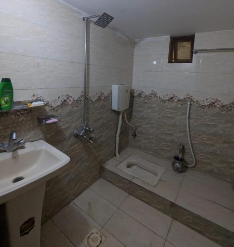 Koupelna v ubytování Ali Properties