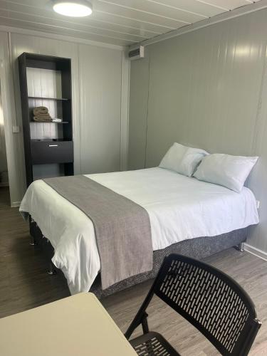 Postel nebo postele na pokoji v ubytování Hotel Hospedaje Alto Lechuza Zarcero