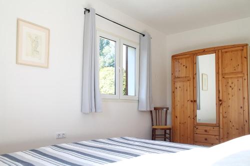Postel nebo postele na pokoji v ubytování Casa a Rudas