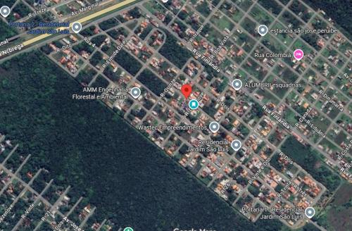 a map of a parking lot with buildings at Casa Santo Sossego in Peruíbe