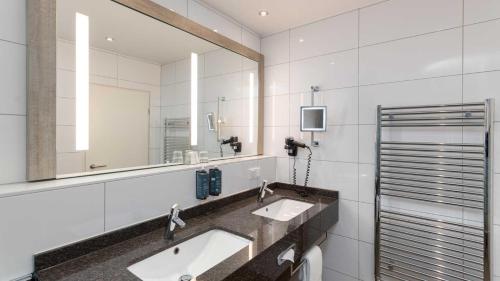Ванная комната в Hotel Lyskirchen Köln