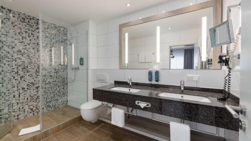 Ванная комната в Hotel Lyskirchen Köln