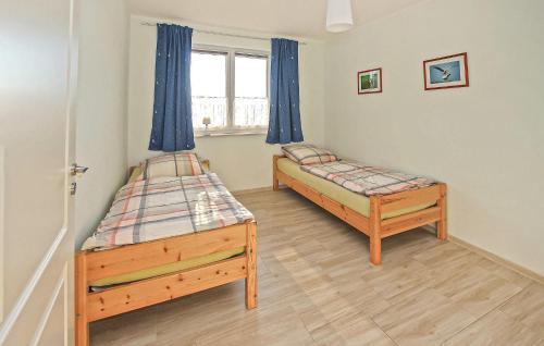 Ένα ή περισσότερα κρεβάτια σε δωμάτιο στο Ferienhaus Grünow Ot Ollendorf