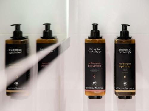 a group of three products on a shelf at Mercure Sydney Manly Warringah in Sydney