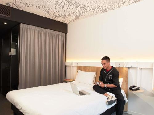 Cama o camas de una habitación en ibis Almaty Jetisu