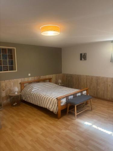 Llit o llits en una habitació de chez Angélique