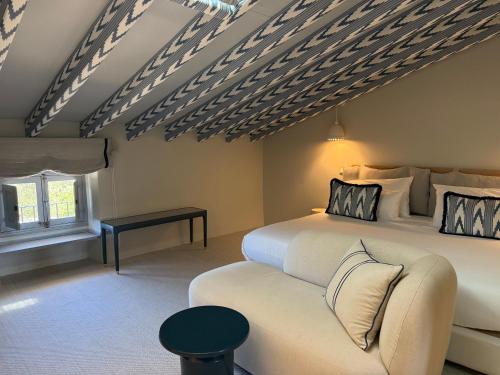 Ένα ή περισσότερα κρεβάτια σε δωμάτιο στο Hotel Son Xotano