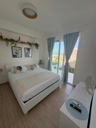 Ένα ή περισσότερα κρεβάτια σε δωμάτιο στο Hakuna Matata Borgo 84