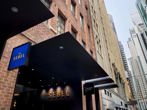 a black awning on a building in a city at The Sebel Sydney Martin Place in Sydney