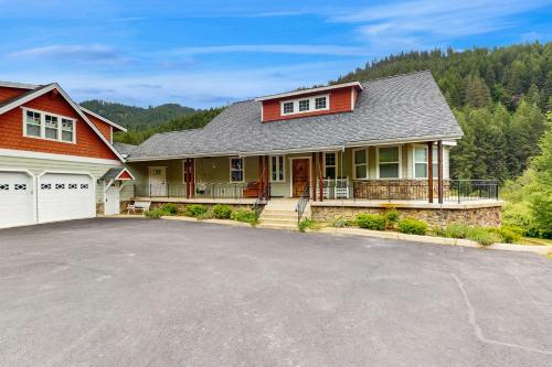 a house with a driveway in front of it at House at Eagle Creek in Leavenworth