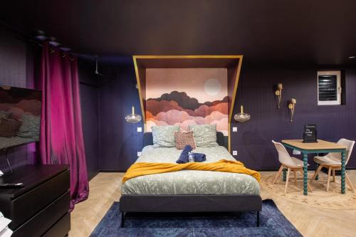 เตียงในห้องที่ Ultra Deluxe Studio, 1000 nuits, Parking sur Place
