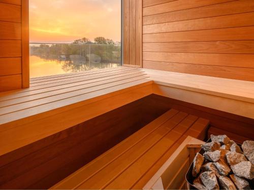 a sauna with a view of the sunset at Mercure Tokaj Center in Tokaj