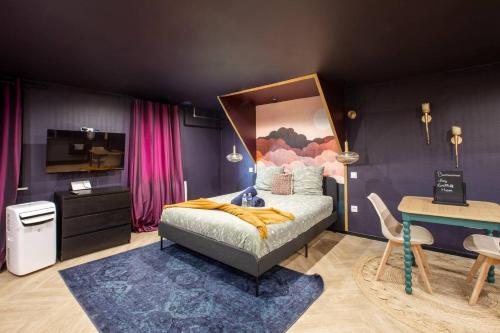 เตียงในห้องที่ Ultra Deluxe Studio, 1000 nuits, Parking sur Place
