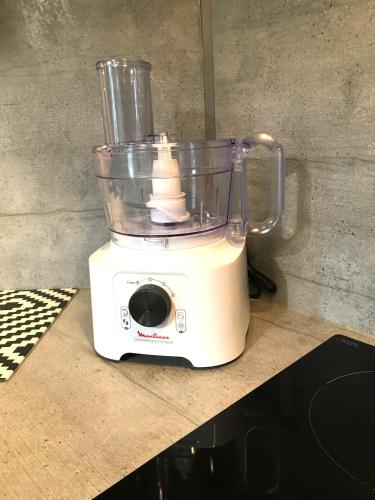 a blender sitting on top of a counter at La Loupiote - Jacuzzi compris SANS supplément ! in Lupcourt