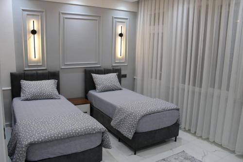 Postel nebo postele na pokoji v ubytování Villa Park Termal Villaları Gazlıgöl