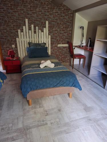 Postel nebo postele na pokoji v ubytování Chambres d'hôtes LA CHAPELAINE