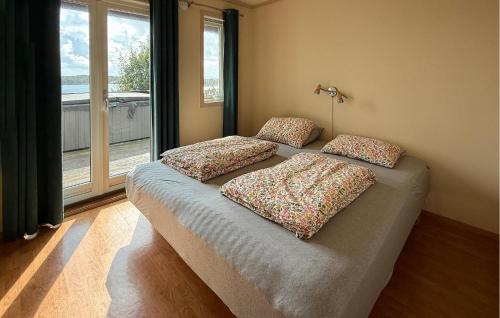 Katil atau katil-katil dalam bilik di Gorgeous Home In Nedstrand With Sauna