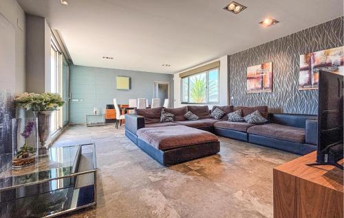 a living room with a couch and a table at Stunning Home In Yecla With Private Swimming Pool, Can Be Inside Or Outside in Yecla