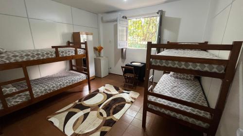 Ένα ή περισσότερα κρεβάτια σε δωμάτιο στο Quartos Largo da 16 COP 30