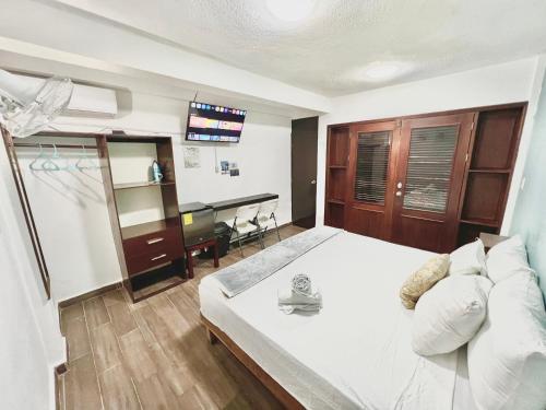 Postel nebo postele na pokoji v ubytování Habitaciones Bacalar MYD