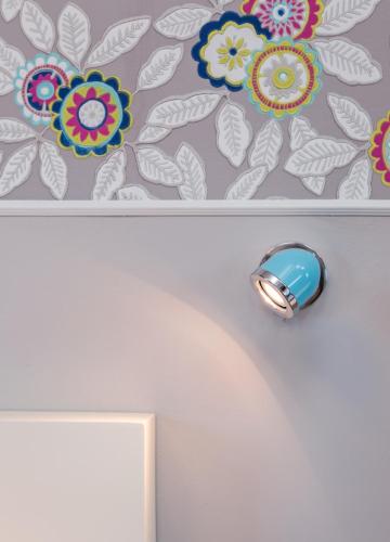 a drawer with a door handle with flowers on the wall at Alma in Caesarea