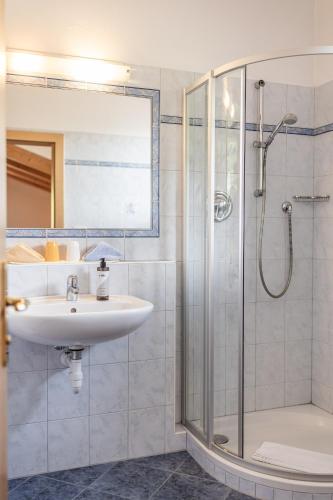 Koupelna v ubytování Hotel Garni Alpes